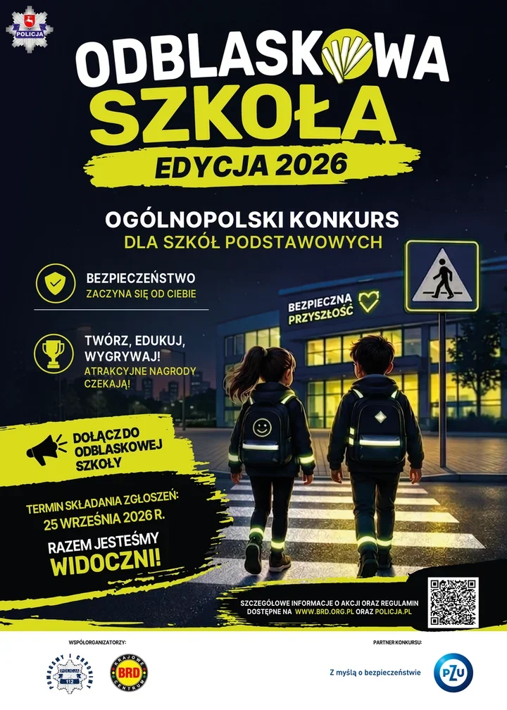 Plakat promujący ogólnopolski konkurs „Odblaskowa Szkoła – Edycja 2026” dla szkół podstawowych, z dwojgiem dzieci w odblaskowych elementach przechodzących przez