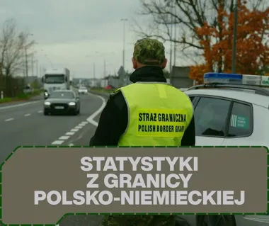 Funkcjonariusz Straży Granicznej stoi przy radiowozie na drodze wzdłuż granicy polsko-niemieckiej.